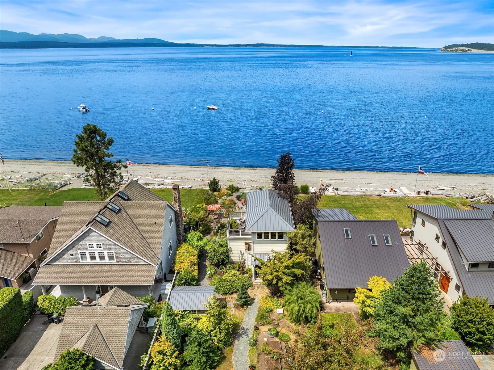 6346 South Bay Road Freeland, WA 98249 - Photo 2 of 40 an aerial view of a house with a garden