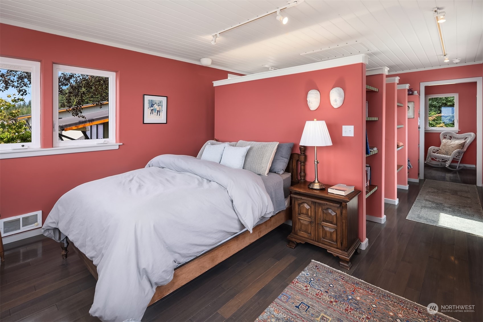 6346 South Bay Road Freeland, WA 98249 - Photo 26 of 40 a bedroom with a bed and wooden floor