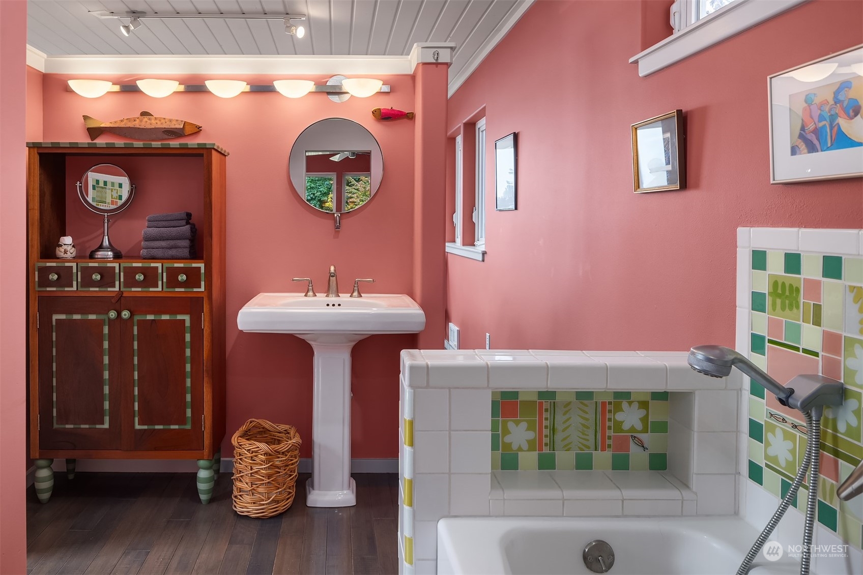 6346 South Bay Road Freeland, WA 98249 - Photo 28 of 40 a bathroom with a sink and a mirror