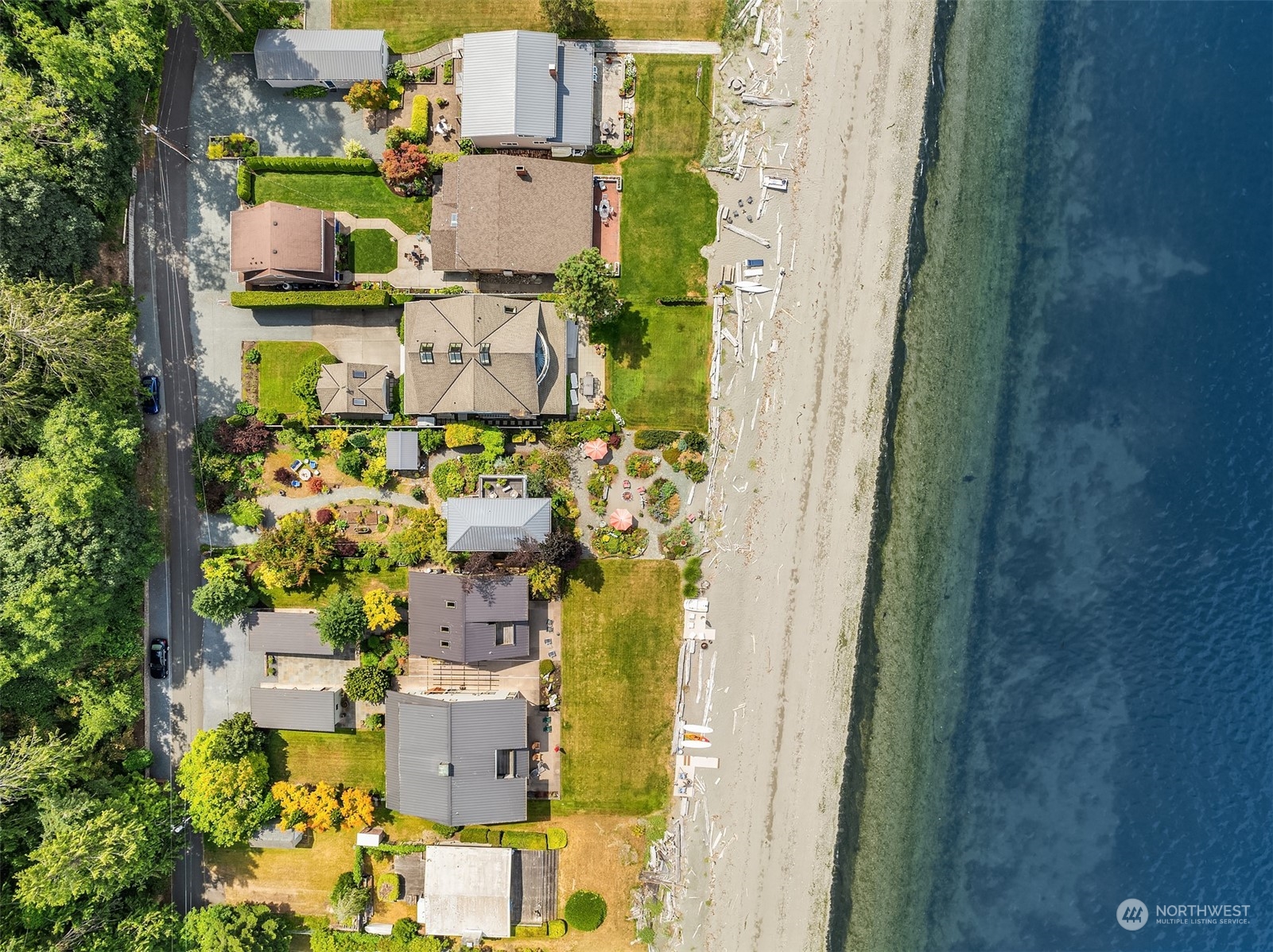 6346 South Bay Road Freeland, WA 98249 - Photo 38 of 40 an aerial view of residential houses with outdoor space and parking