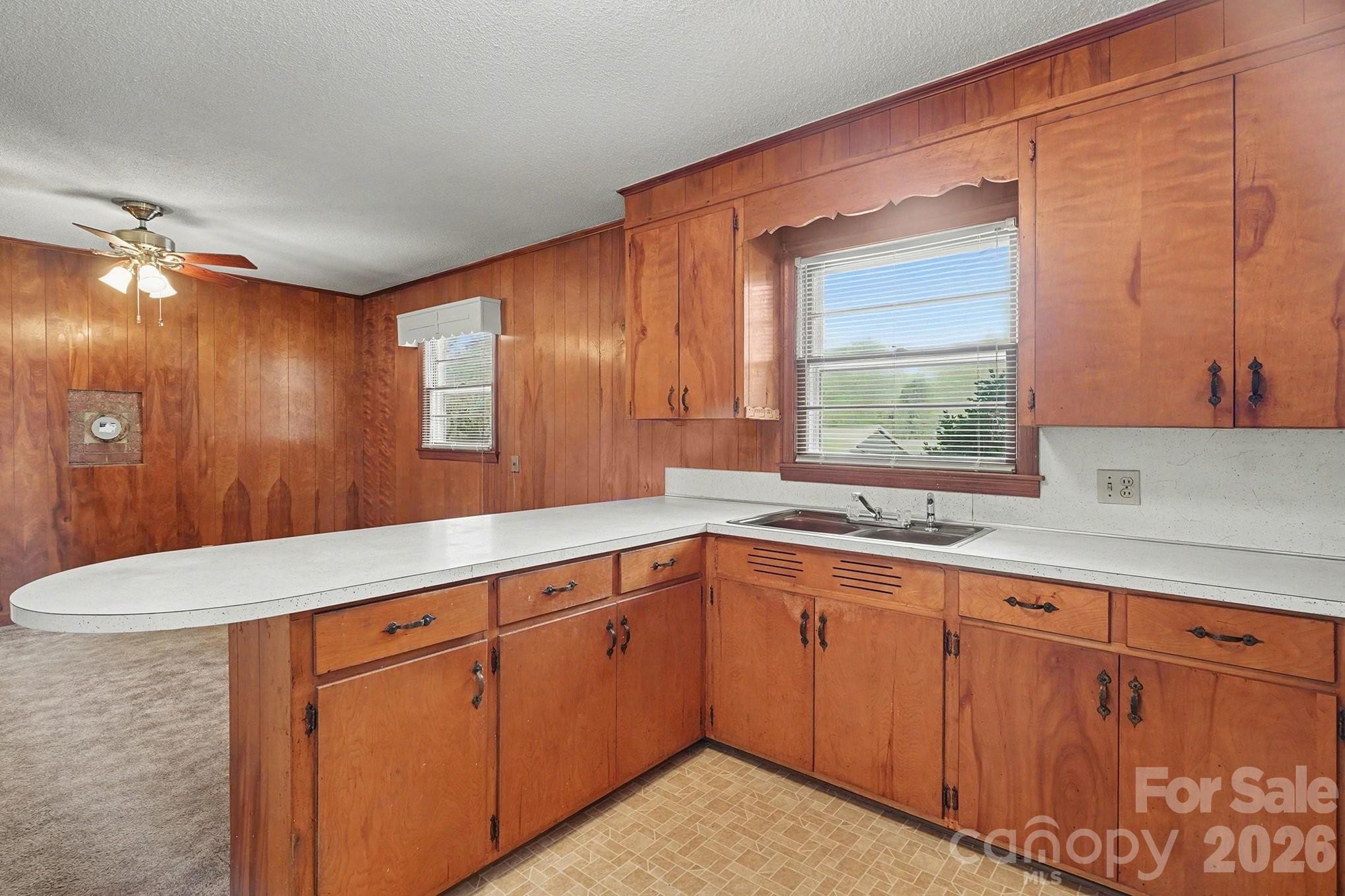 1612 Shelby Road, Unit 1417 Kings Mountain, NC 28086 - Photo 15 of 29 a kitchen with a sink and large window