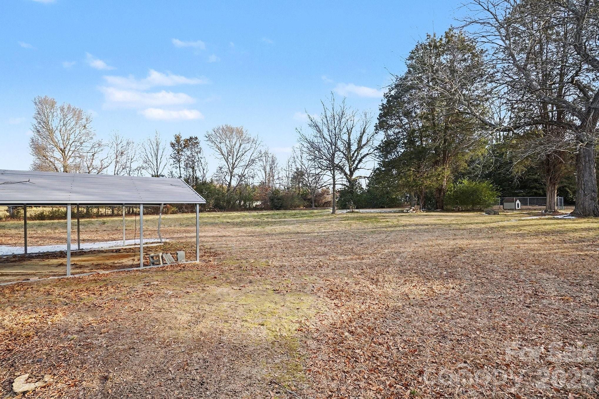 1612 Shelby Road, Unit 1417 Kings Mountain, NC 28086 - Photo 21 of 29 a view of outdoor space yard and basketball court