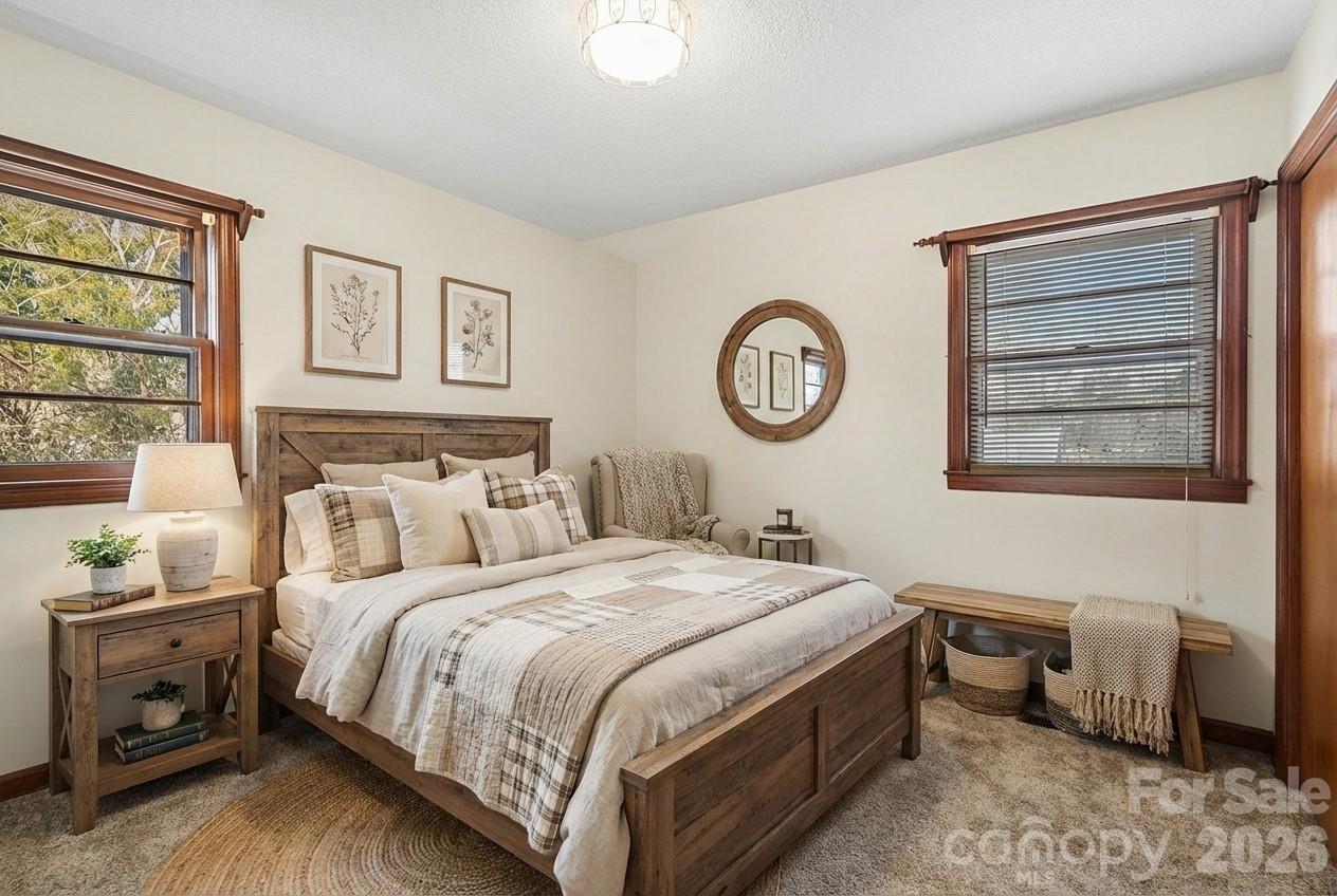 1612 Shelby Road, Unit 1417 Kings Mountain, NC 28086 - Photo 3 of 29 a bedroom with a bed and a window