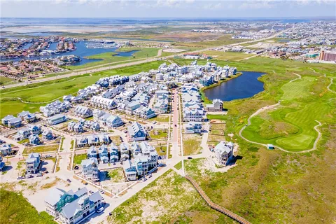 a view of a city with an ocean