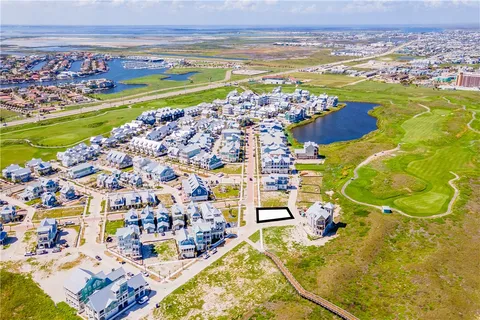 a view of a city with an ocean