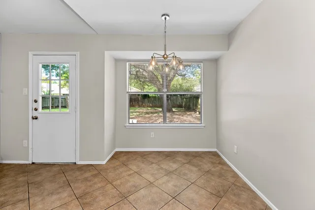 a view of an empty room with window