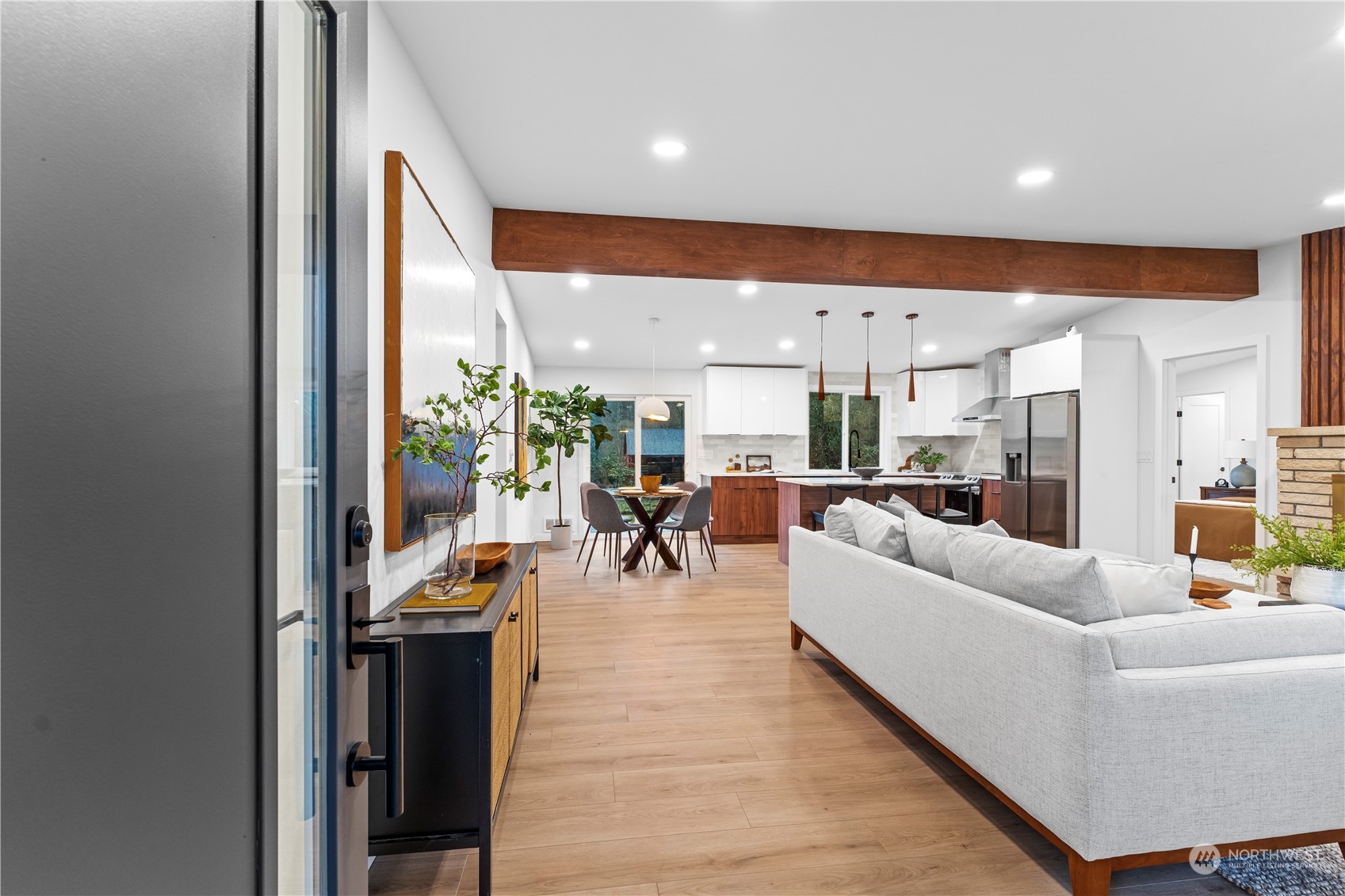 23033 192nd Avenue Southeast Renton, WA 98058 - Photo 12 of 40 a living room with furniture kitchen view and a large window