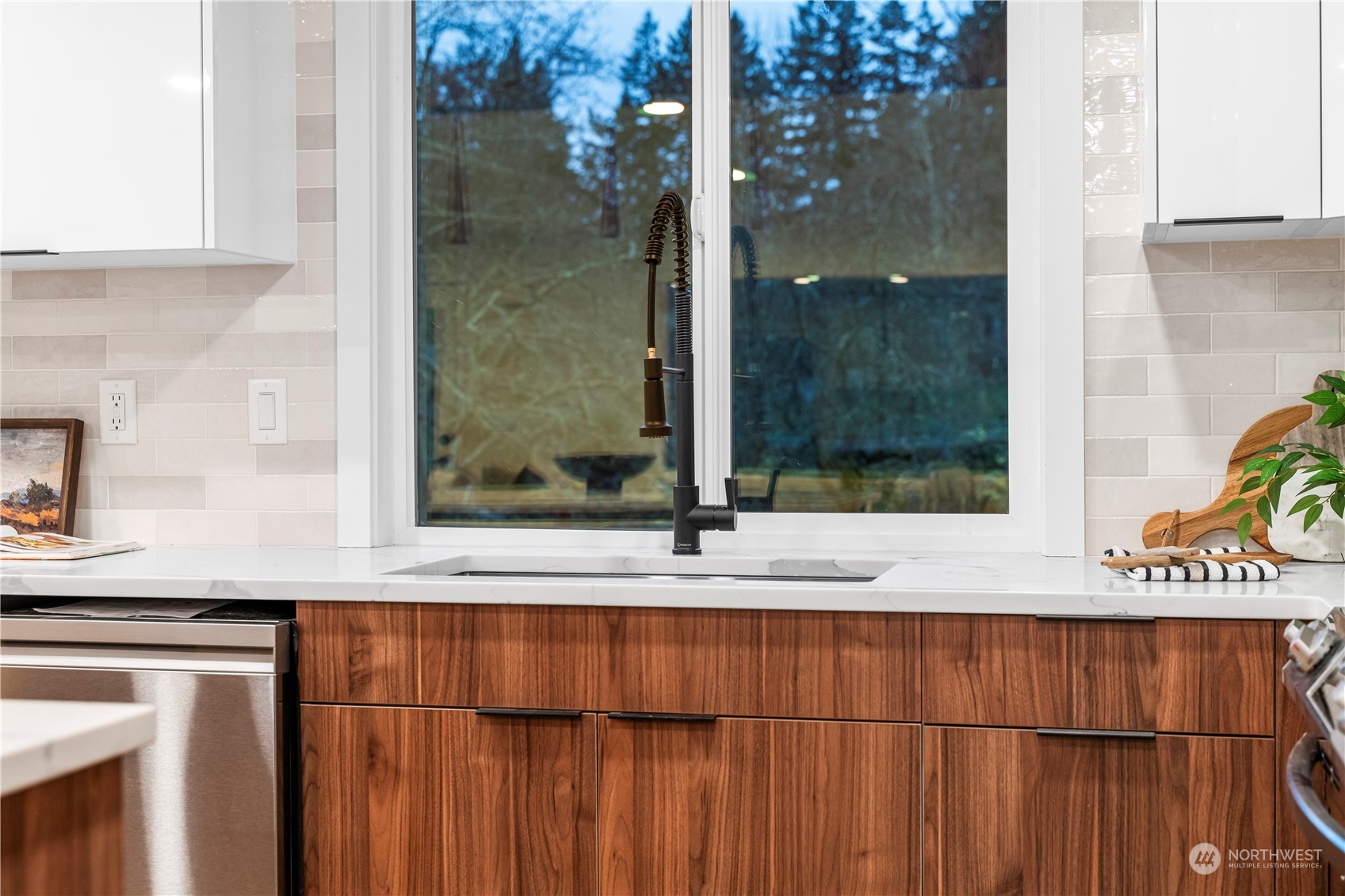 23033 192nd Avenue Southeast Renton, WA 98058 - Photo 16 of 40 a kitchen with a sink and a mirror