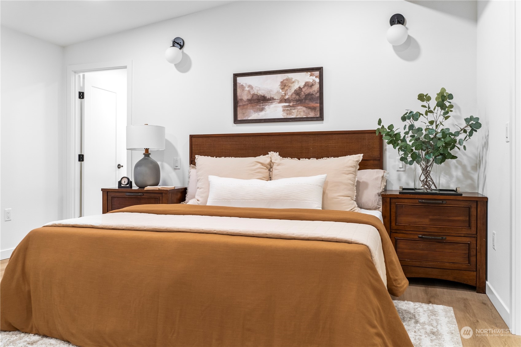 23033 192nd Avenue Southeast Renton, WA 98058 - Photo 18 of 40 a bedroom with bed and paintings on the wall