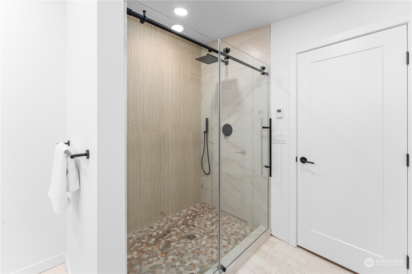 23033 192nd Avenue Southeast Renton, WA 98058 - Photo 20 of 40 a bathroom with a shower and a sink