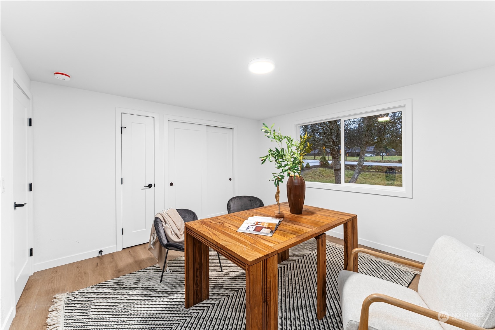 23033 192nd Avenue Southeast Renton, WA 98058 - Photo 23 of 40 a dining room with furniture and window