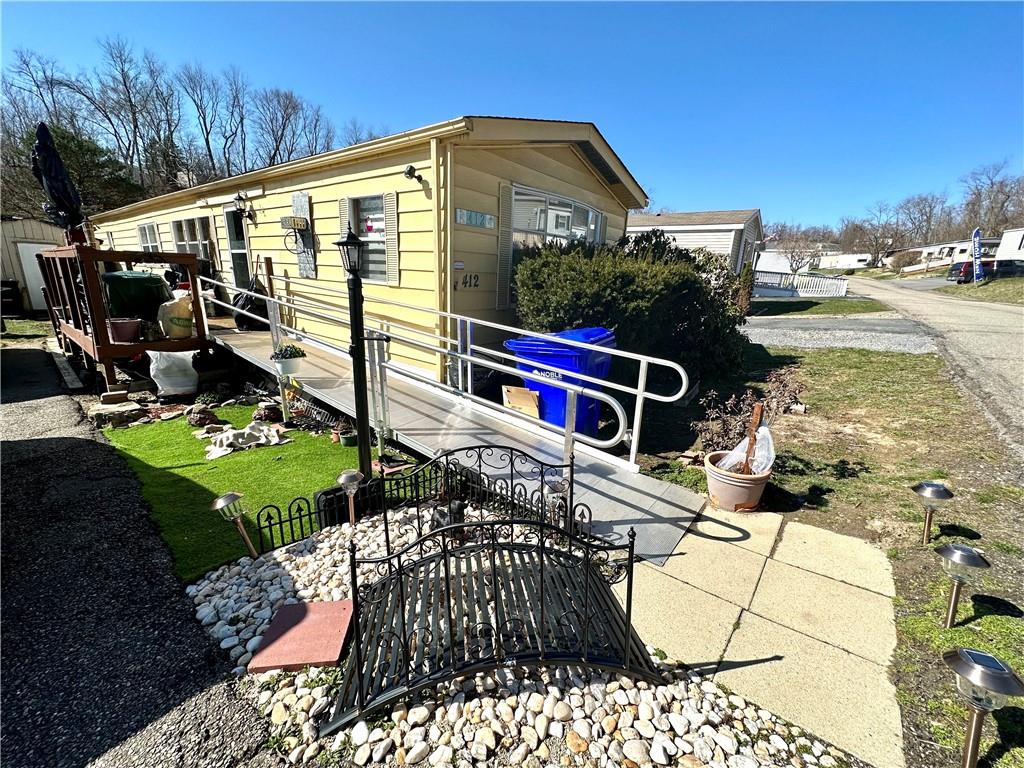 412 Richmond Road Imperial, PA 15126 - Photo 2 of 12 a front view of a house with a yard