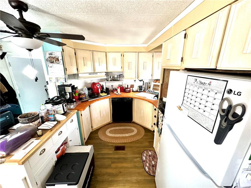 412 Richmond Road Imperial, PA 15126 - Photo 6 of 12 a view of a kitchen with fridge and workspace