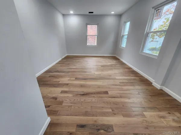 an empty room with windows
