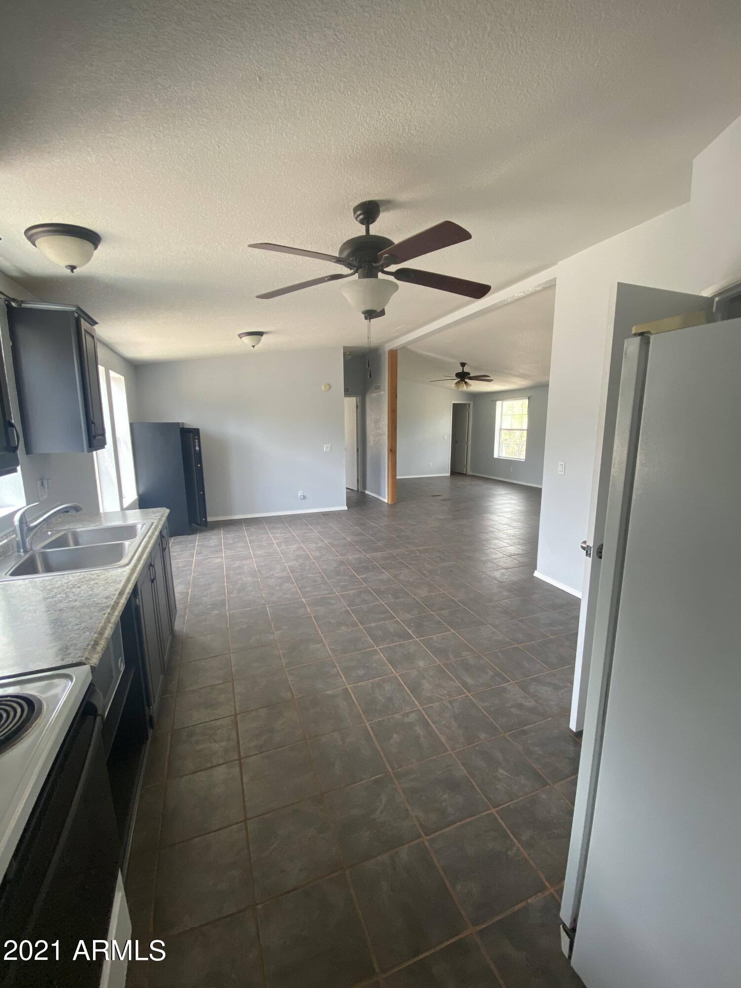 8601 Poland Road Mayer, AZ 86333 - Photo 29 of 58 Kitchen Entry From Laundry Room