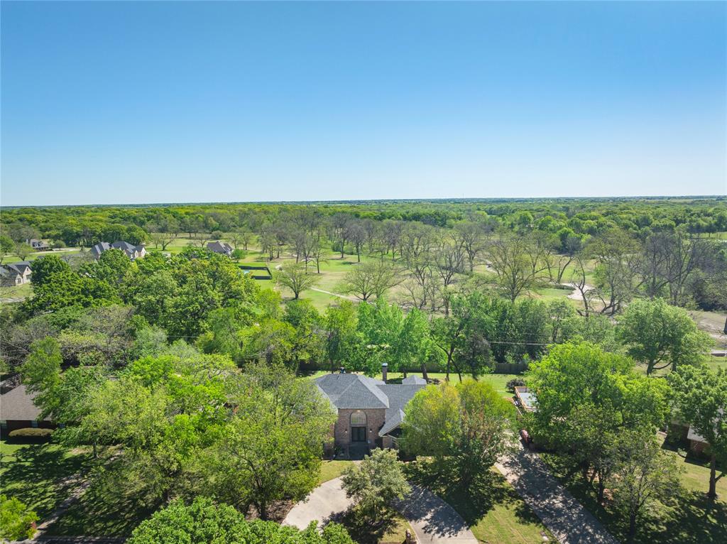 2020 Arbor Bend Road Bonham, TX 75418 - Photo 36 of 40 Drone / aerial view of a heavily wooded area