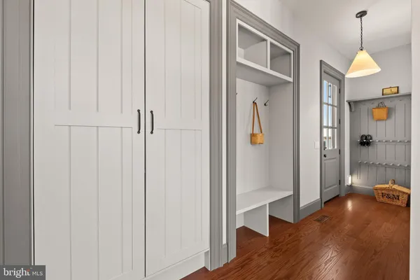 a view of a bathroom with mirror