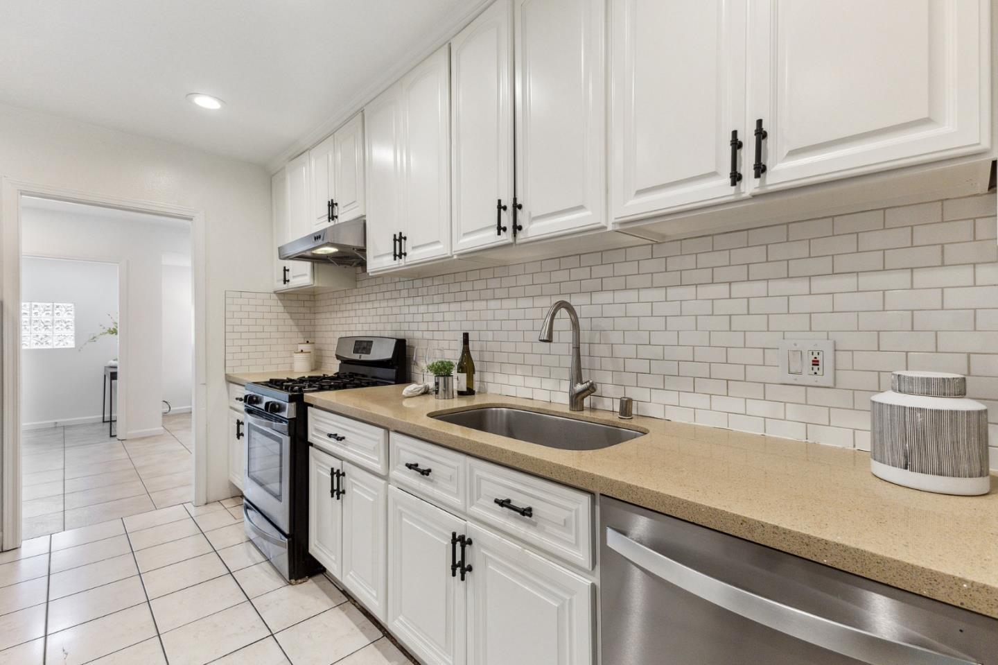 274 West Jackson Street Hayward, CA 94544 - Photo 16 of 29 a kitchen with a sink and cabinets