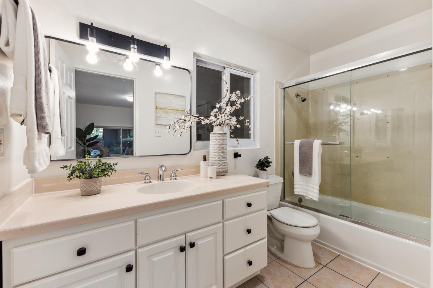 274 West Jackson Street Hayward, CA 94544 - Photo 26 of 29 a bathroom with a sink a toilet and shower