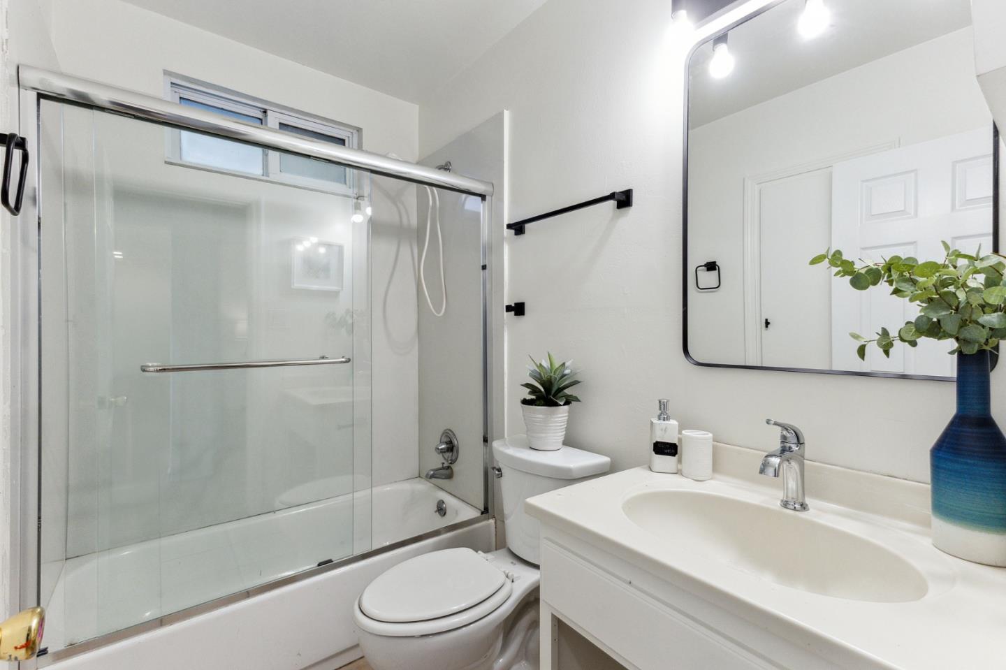 274 West Jackson Street Hayward, CA 94544 - Photo 10 of 29 a bathroom with a sink toilet and shower