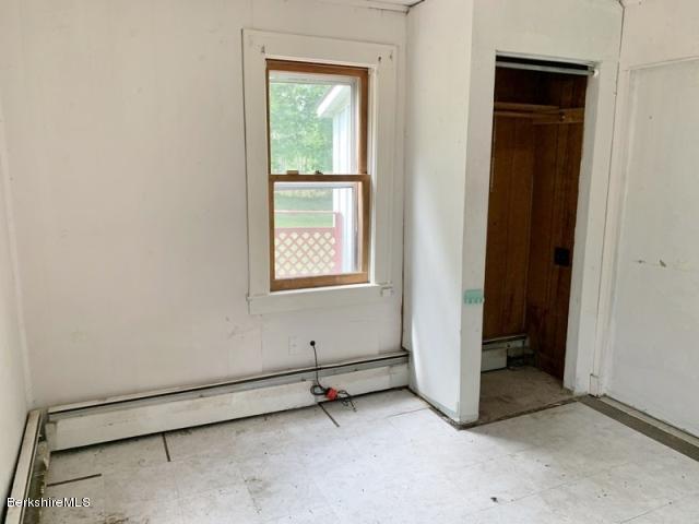 115 Lenox Road Richmond, MA 01254 - Photo 14 of 29 an empty room with windows