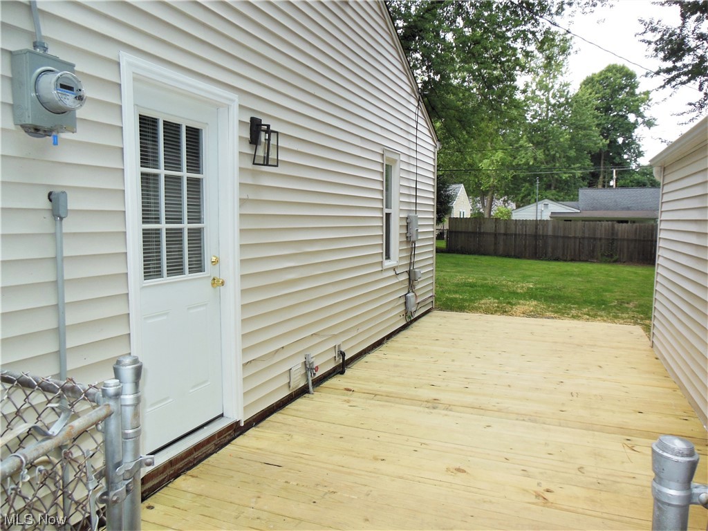 1958 Clyde Road Madison, OH 44057 - Photo 6 of 12 Side Deck between house & garage.