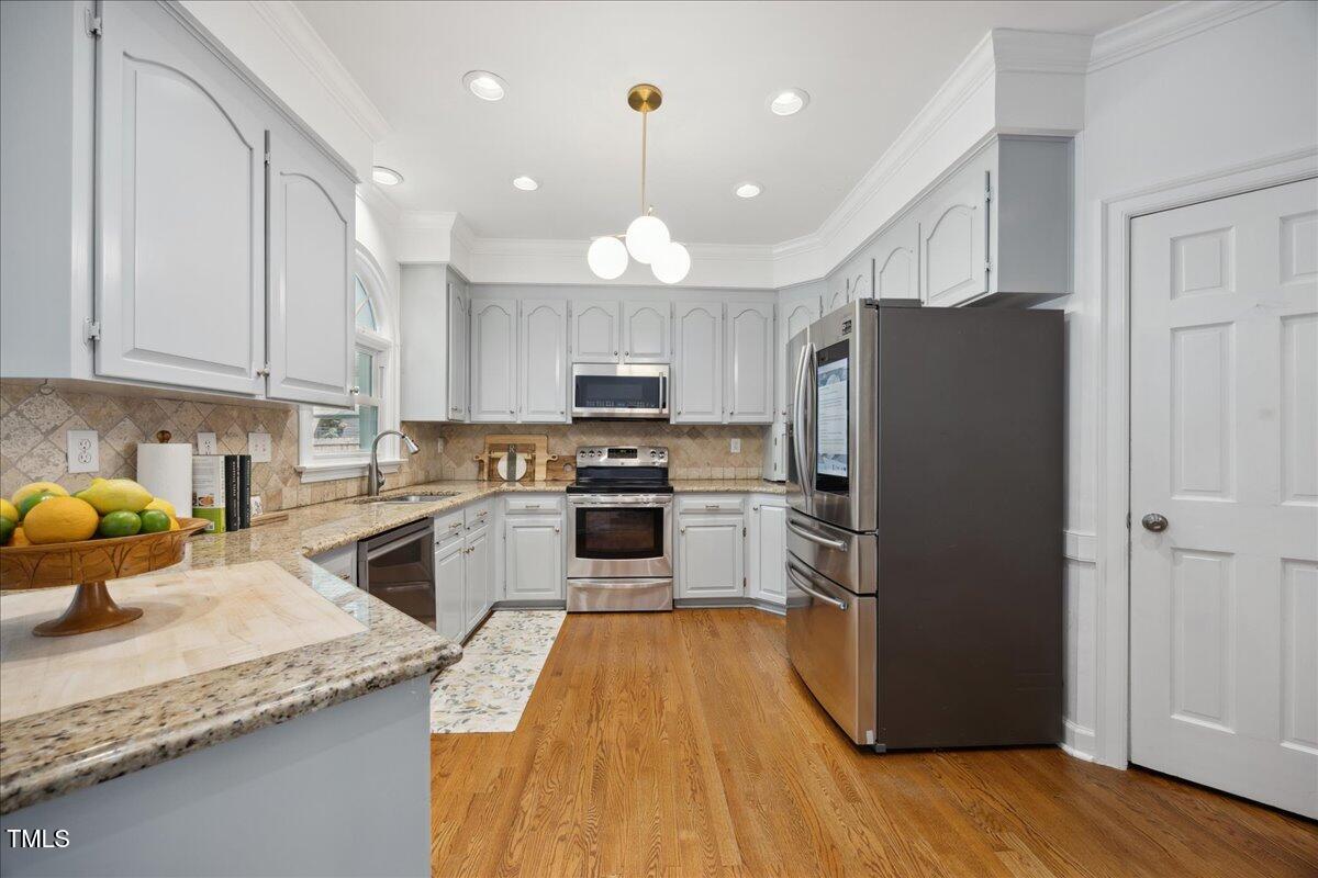 7917 Rooksley Court Raleigh, NC 27615 - Photo 17 of 45 kitchen