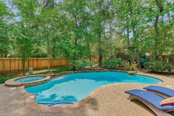 $950,000 | 19 Craggy Rock Street, The Woodlands, TX 77381