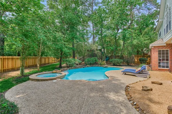 $950,000 | 19 Craggy Rock Street, The Woodlands, TX 77381
