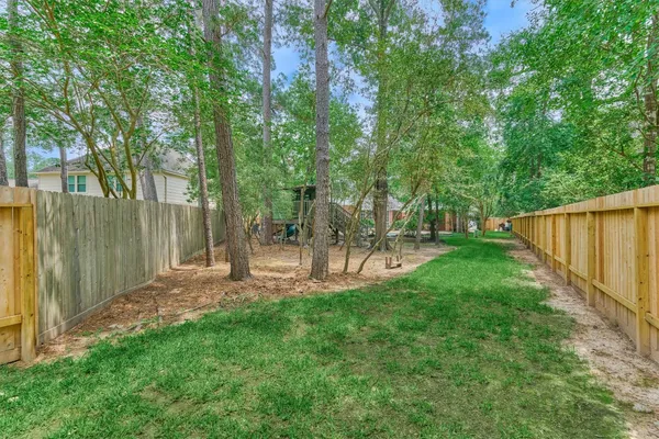 $950,000 | 19 Craggy Rock Street, The Woodlands, TX 77381