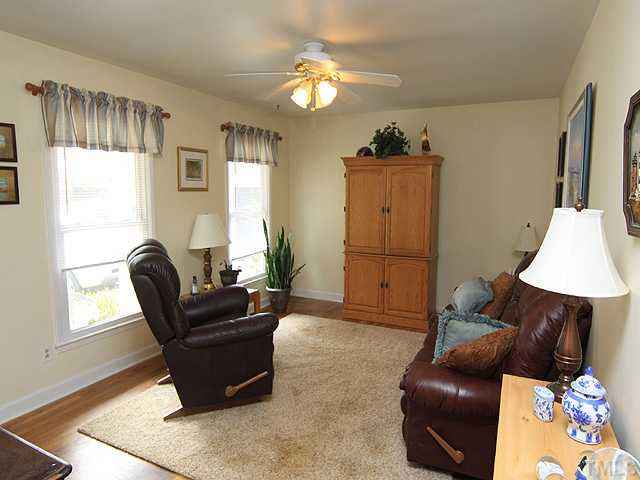1529 Clermont Road Durham, NC 27713 - Photo 5 of 12 a living room with furniture and a window