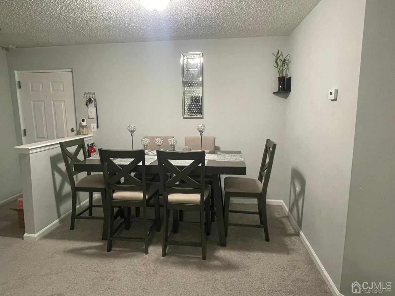 824 Edpas Road New Brunswick, NJ 08901 - Photo 3 of 13 a view of a dining room with furniture and window