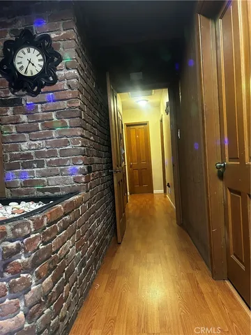 a view of entryway with a flower pot and a fireplace