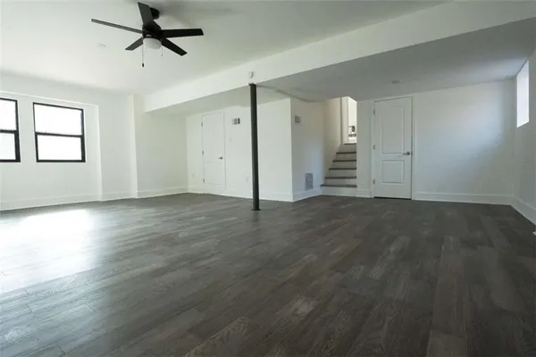 a livingroom with furniture and wooden floor