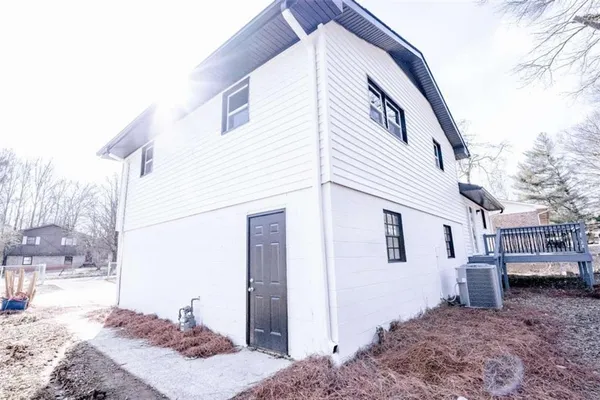 a balcony with wooden floor