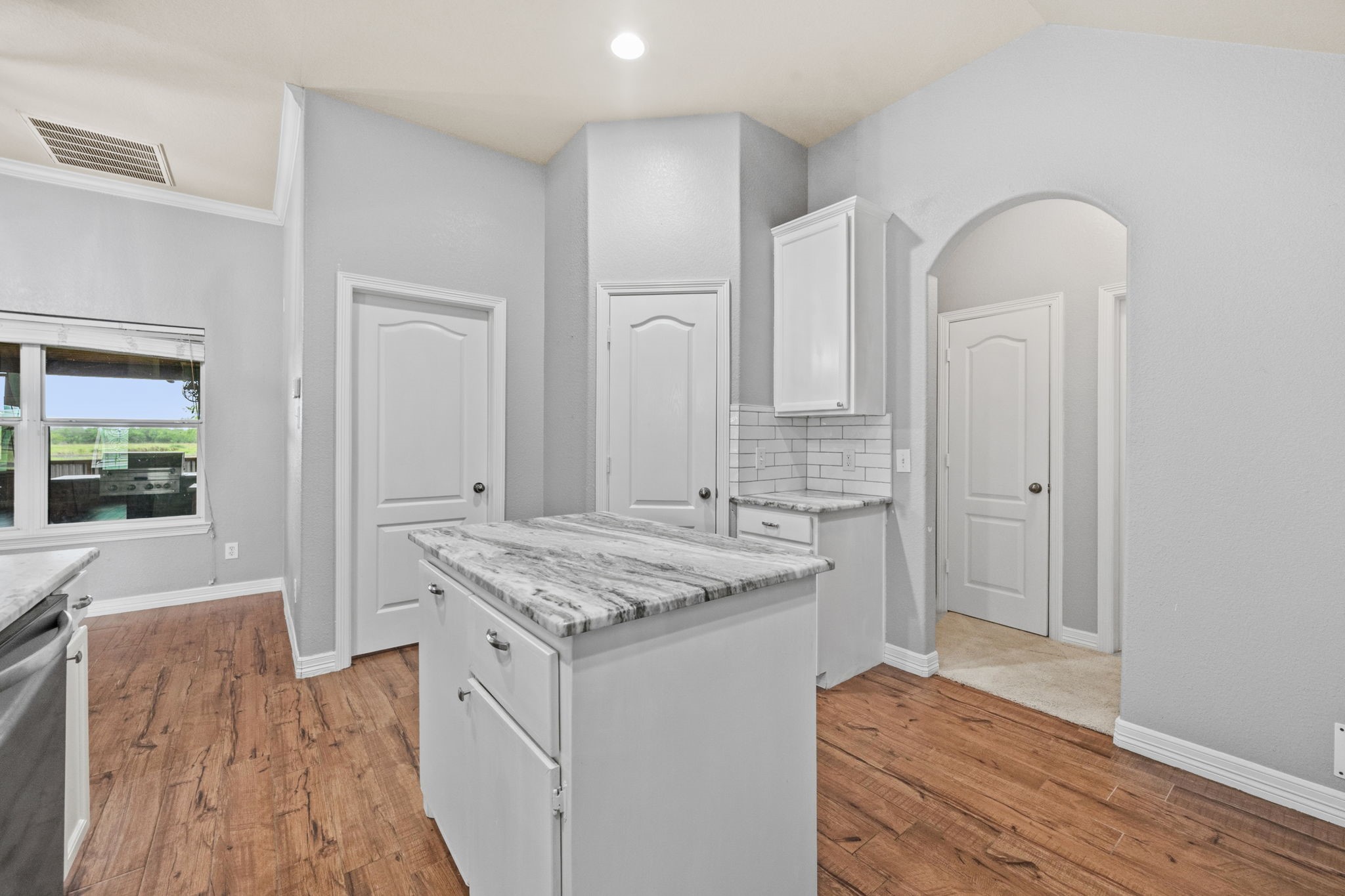 1405 Big Hill Road Winnie, TX 77665 - Photo 25 of 43 a bathroom with a sink a vanity and a mirror