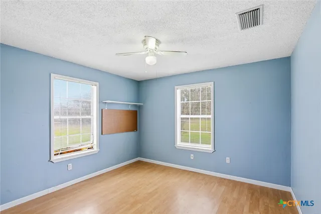 a view of a backyard with a garden