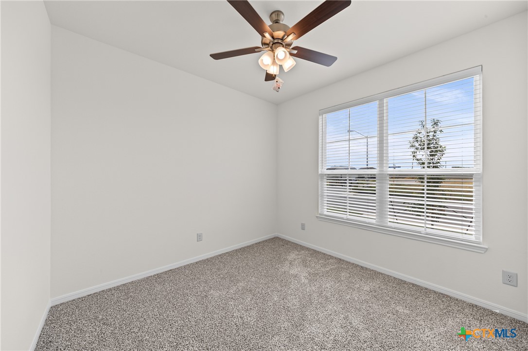 7806 Timber Holw Lane Temple, TX 76502 - Photo 18 of 30 a view of an empty room with a window