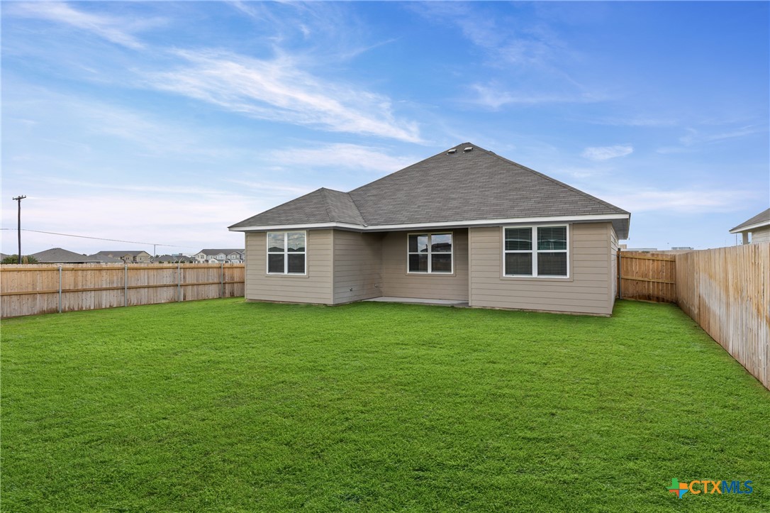 7806 Timber Holw Lane Temple, TX 76502 - Photo 30 of 30 a backyard of a house with lots of green space