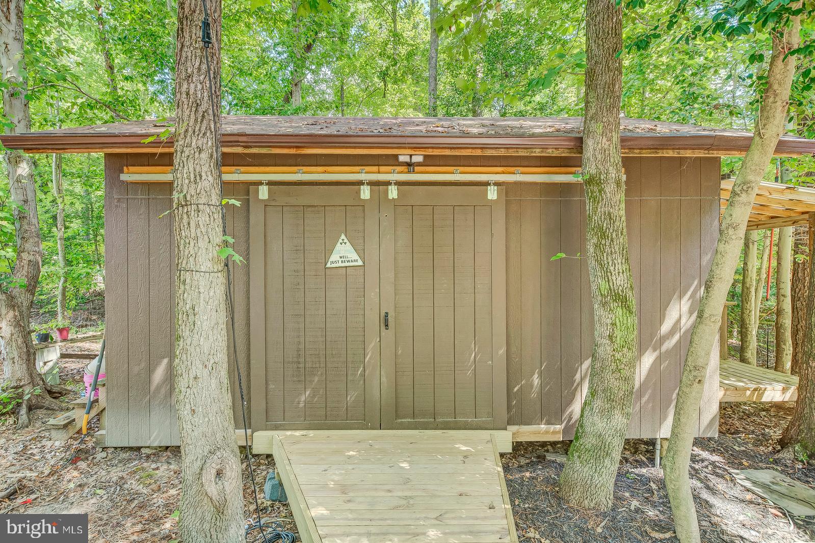 13095 Olivet Road Lusby, MD 20657 - Photo 9 of 48 Wood shop off of the deck