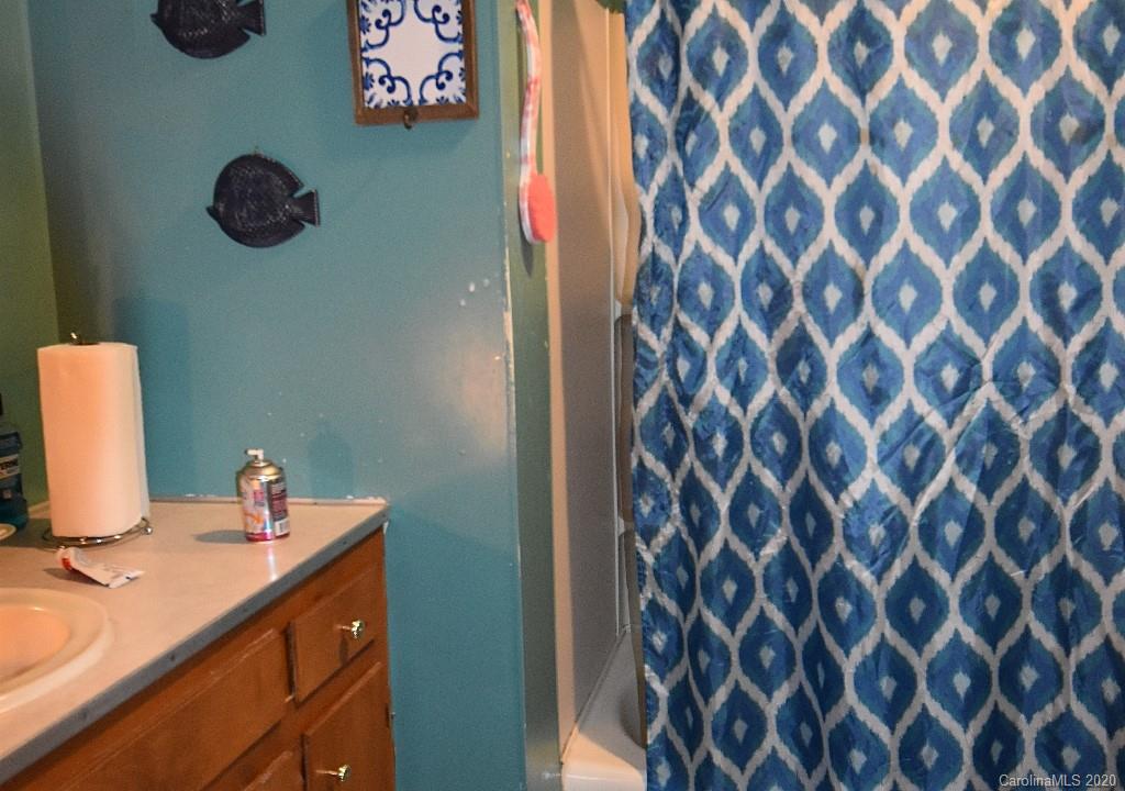 1667 Carter Road Lancaster, SC 29720 - Photo 12 of 15 a bathroom with a sink and a mirror