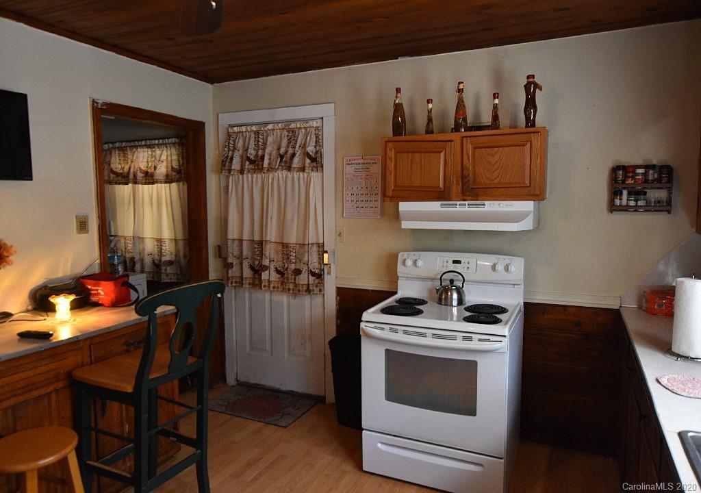 1667 Carter Road Lancaster, SC 29720 - Photo 8 of 15 a kitchen with stainless steel appliances a stove a sink and a refrigerator