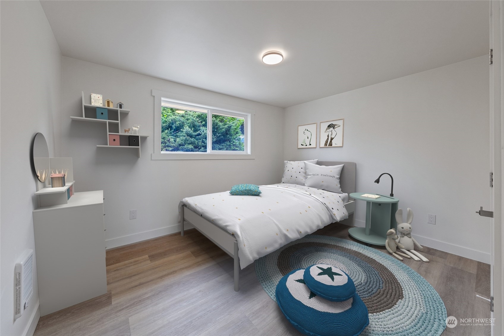 7614 South 113th Street Seattle, WA 98178 - Photo 5 of 24 a bedroom with a bed and a table