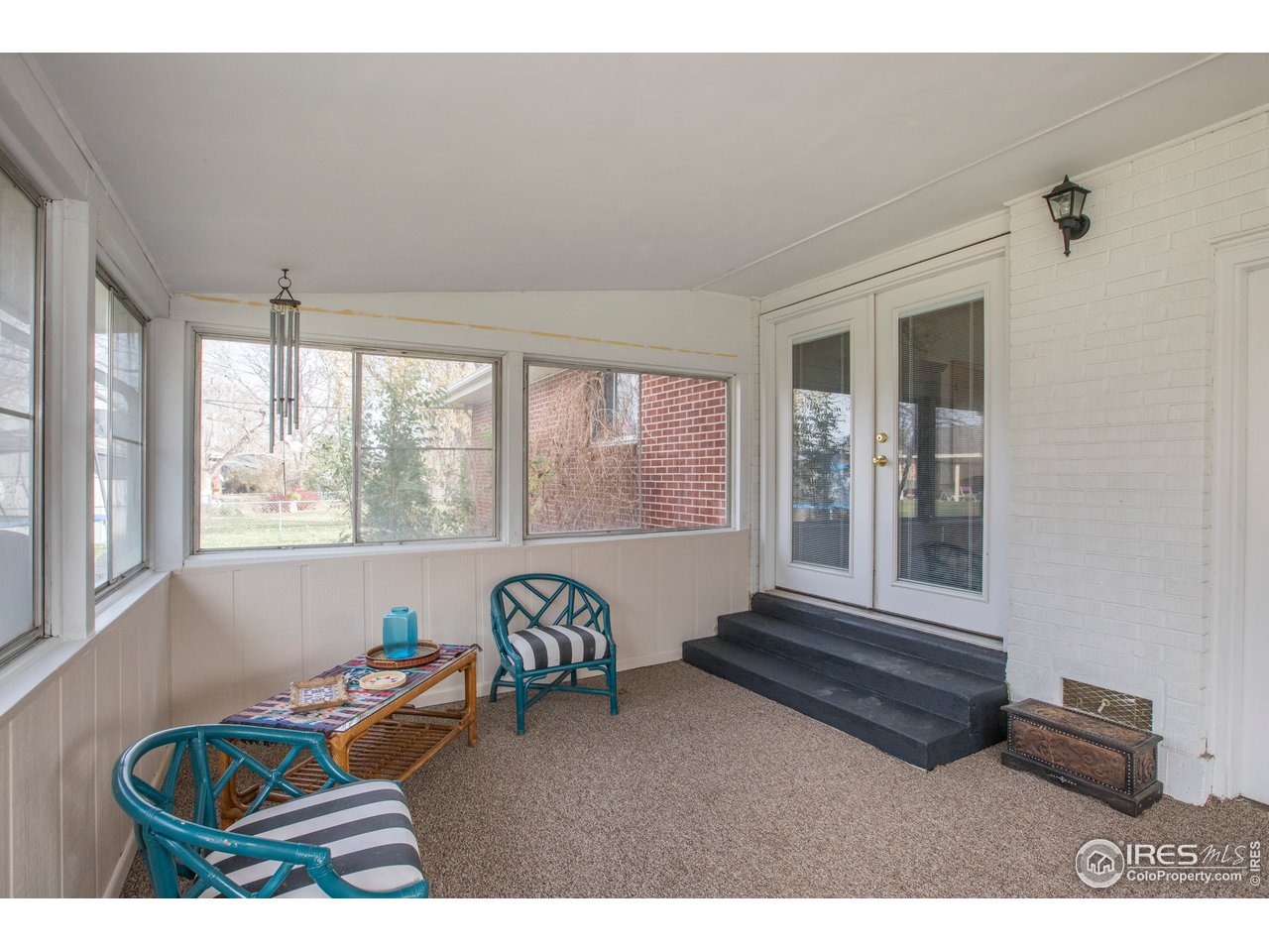 2037 26th Street Road Greeley, CO 80631 - Photo 16 of 21 Summer porch