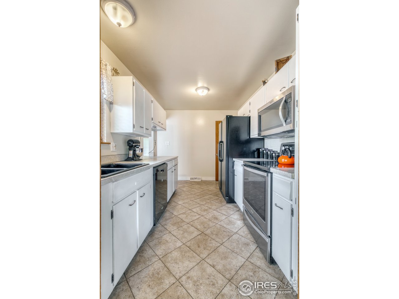 2037 26th Street Road Greeley, CO 80631 - Photo 9 of 21 galley kitchen
