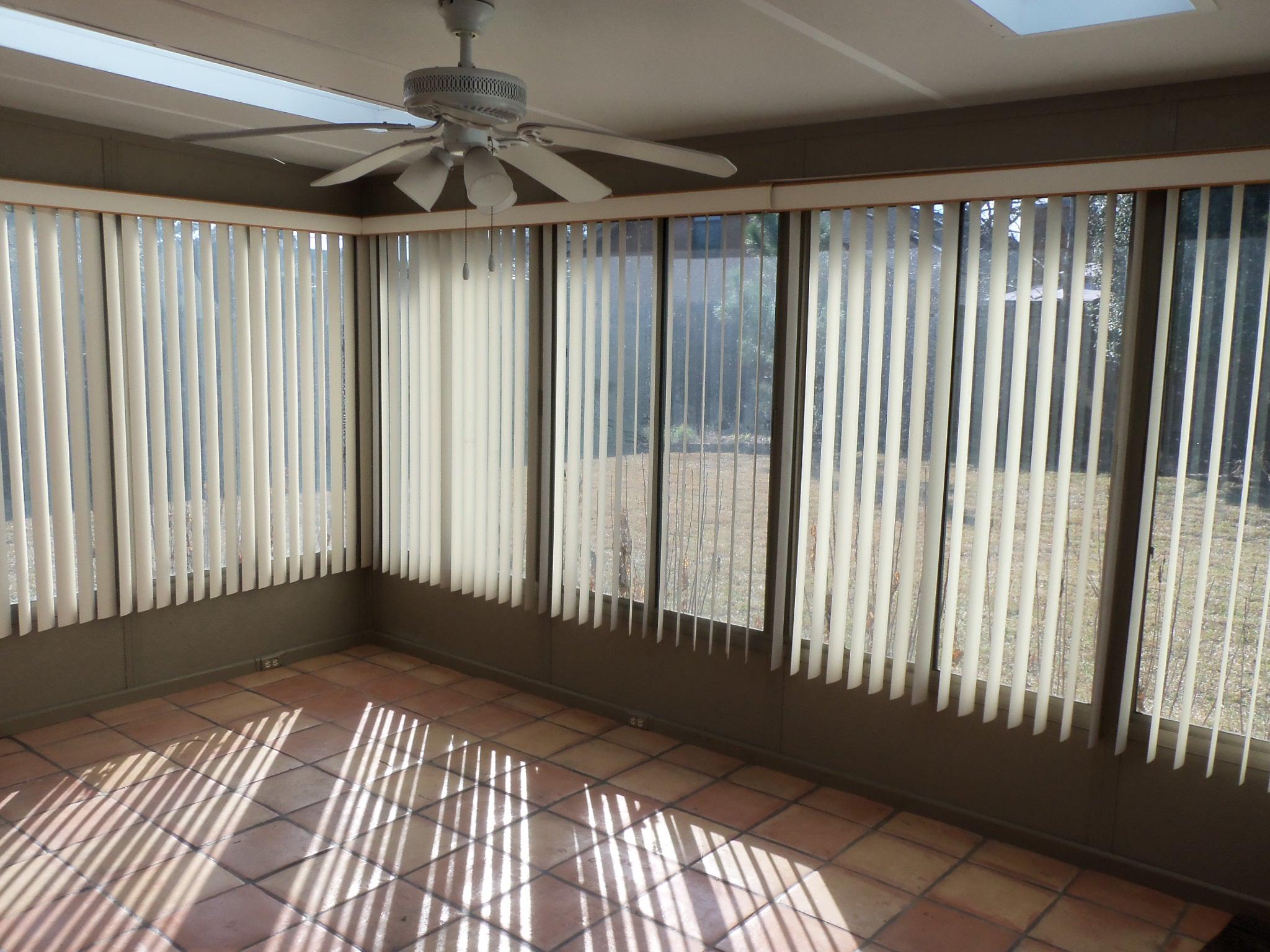 245 Elliott Road Mary Esther, FL 32569 - Photo 8 of 13 a view of an empty room with a window