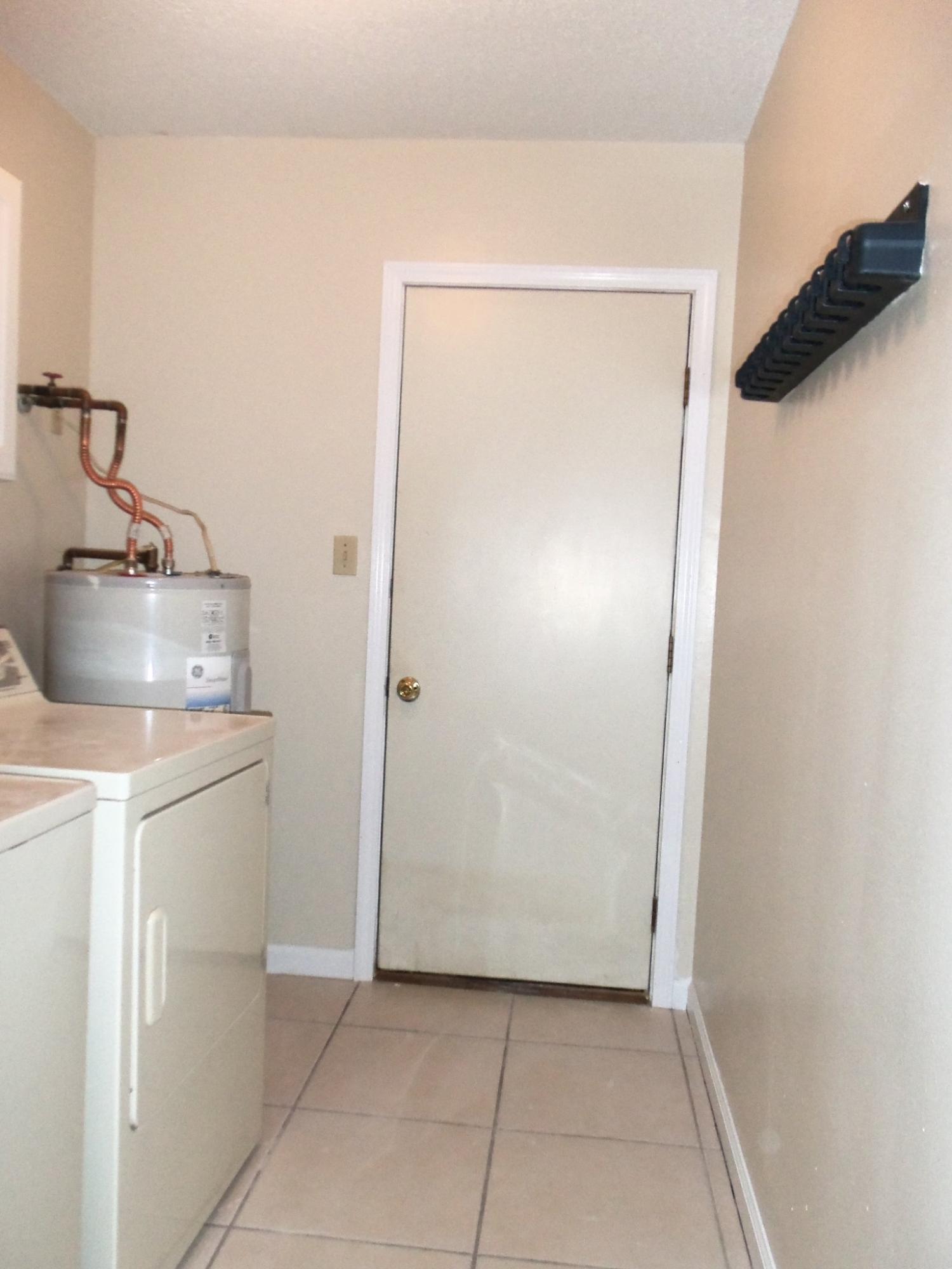 245 Elliott Road Mary Esther, FL 32569 - Photo 9 of 13 a room with a washer and dryer