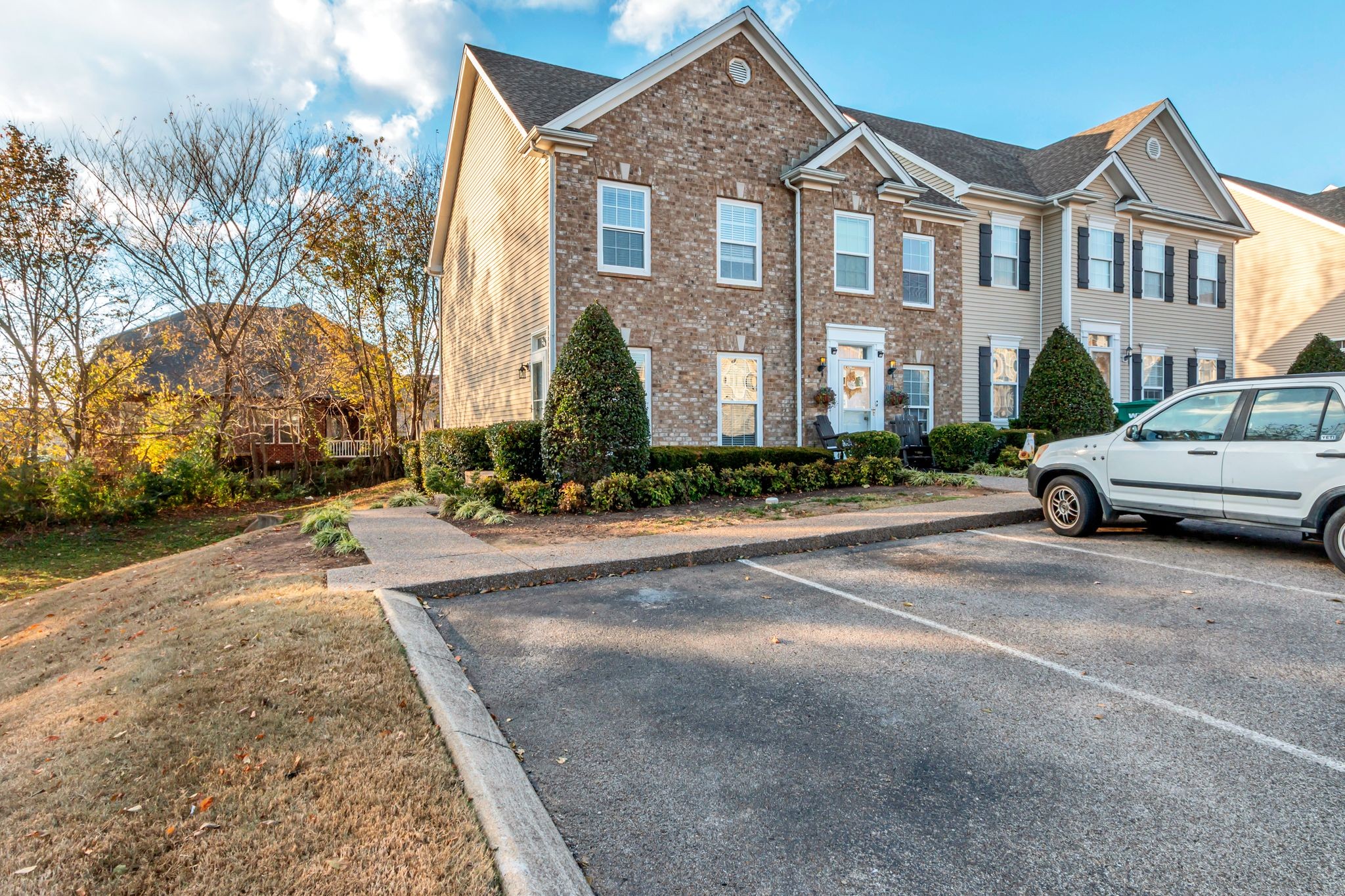 a city street lined with buildings and cars