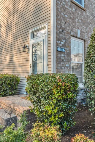 a view of a house with a garden