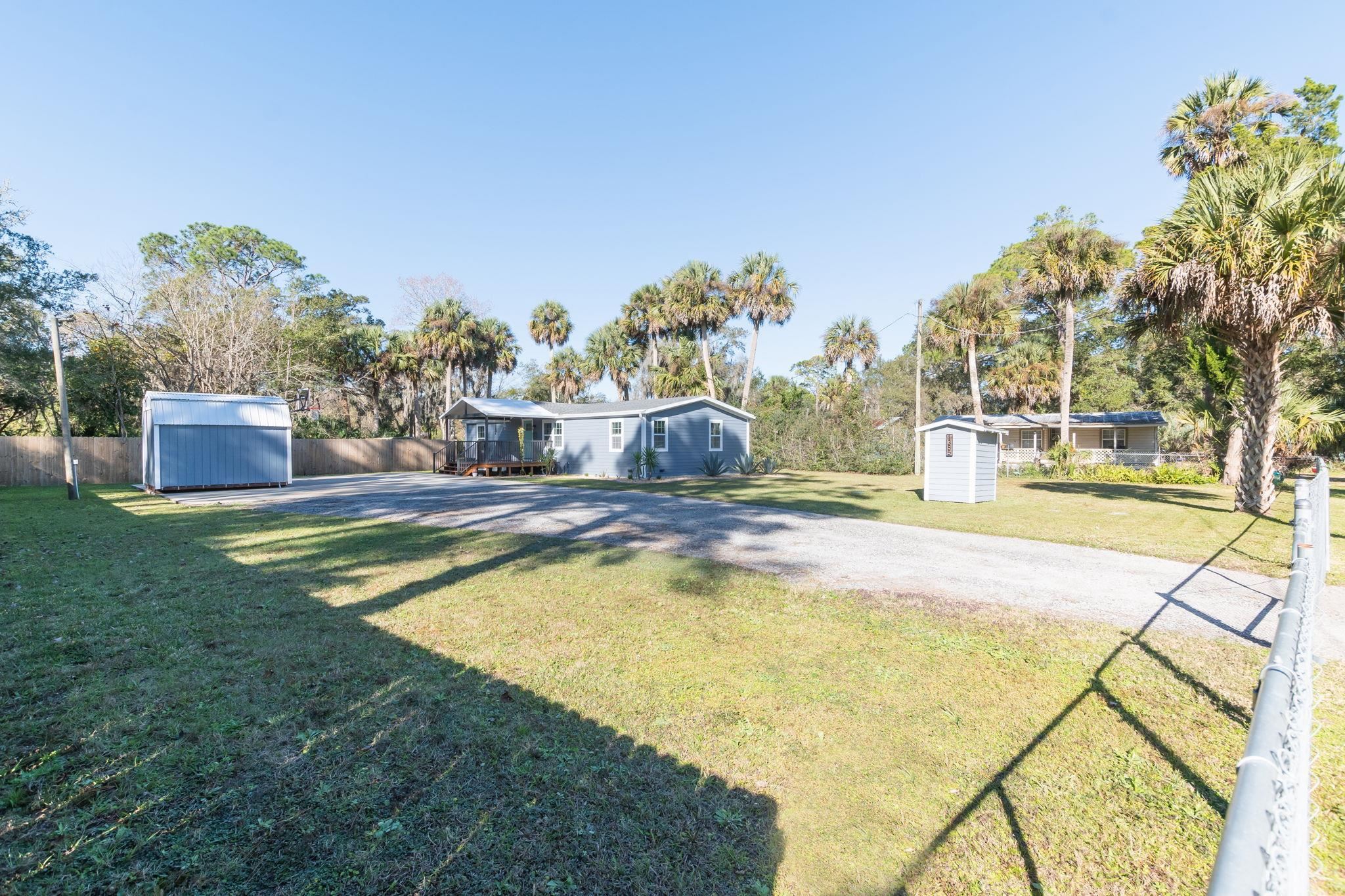 1385 Highland Boulevard St. Augustine, FL 32084 - Photo 37 of 47 a view of a swimming pool with a patio